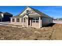 Newly built home with brick and siding exterior at 7840 Magnolia St, New Palestine, IN 46163