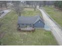 Aerial view of the property showcasing its wooden deck and exterior details at 11197 N Gasburg Rd, Mooresville, IN 46158