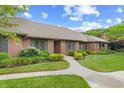 Lovely brick home with a well-maintained lawn and a welcoming walkway at 316 Northpointe Ct, Danville, IN 46122
