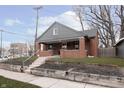 Charming brick home with gray accents and a landscaped yard at 726 E 54Th St, Indianapolis, IN 46220