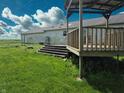 Deck with stairs that leads to a backyard with grass at 4726 E 210 N, Lebanon, IN 46052
