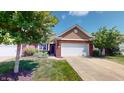 Charming single-Gathering home with well-manicured lawn and a two car garage at 3538 Heathcliff Ct, Westfield, IN 46074