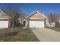 Brick front ranch home with attached garage and landscaping at 3538 Heathcliff Ct, Westfield, IN 46074