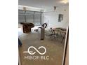 Spacious garage offering ample room for parking and storage with an automatic garage door at 1433 Wigwam Ln, Martinsville, IN 46151