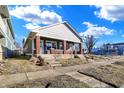 Beautiful two-story home showcasing a well-manicured lawn and a welcoming front porch at 1622 Prospect St, Indianapolis, IN 46203