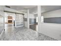 Open concept entryway with barn door, hardwood and tile floors at 2959 Hearthside Dr, Greenwood, IN 46143