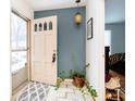 Inviting entryway with tiled floor and a plant at 628 Folcroft Ct, Indianapolis, IN 46234