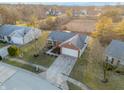 Aerial view of ranch home in residential neighborhood at 18490 Harvest Meadows E Dr, Westfield, IN 46074