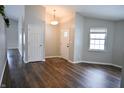 Spacious entryway, hardwood floors, coat closet, and natural light at 12334 Buckley Blvd, Cumberland, IN 46229