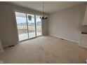 Dining room with a sliding glass door leading to outdoor space at 20022 Boulder Brook Ln, Westfield, IN 46074