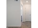 Small powder room with pedestal sink and tile flooring at 4612 Amber Wood Dr, Indianapolis, IN 46235