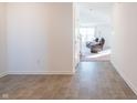 Open living room with tile flooring and recessed lighting at 4612 Amber Wood Dr, Indianapolis, IN 46235