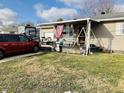 House exterior featuring a covered porch with seating at 1226 E Mckay Rd, Shelbyville, IN 46176