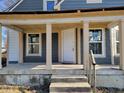 Renovated front porch with new door and windows, ready to enjoy at 2955 N Olney St, Indianapolis, IN 46218