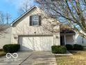 Two-story house featuring a front porch and mature trees at 3660 Cedar Pine Pl, Indianapolis, IN 46235