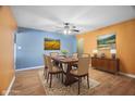 Inviting dining room featuring modern table set, stylish decor, and light wood floors at 3830 Pineview Ln, Greenwood, IN 46142