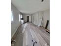 Living room with new wood-look flooring and gray walls at 1445 W 34Th St, Indianapolis, IN 46208