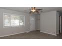 Spacious living room with neutral walls and ceiling fan at 2819 Carla Ct, Indianapolis, IN 46219