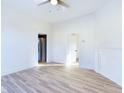 Spacious living room featuring hardwood floors and a fireplace at 3420 Clark St, Anderson, IN 46013