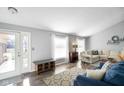Spacious living room with vaulted ceiling and comfy furniture at 3699 Lisa Ln, Plainfield, IN 46168