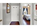 Hallway with hardwood floors, leading to bedroom at 4193 Sycamore Ct, Franklin, IN 46131