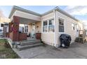 Brick front porch, inviting entrance to this charming bungalow at 4815 English Ave, Indianapolis, IN 46201