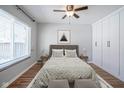 Spacious bedroom with large windows, hardwood floors, and built in wardrobe at 6027 Central Ave, Indianapolis, IN 46220