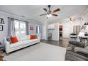 Open living room with view into kitchen and dining area at 8007 Bryan Dr, Indianapolis, IN 46227