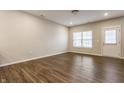 Bright living room featuring wood floors and large windows at 3627 Thomas Jefferson St, Westfield, IN 46074