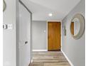 Apartment entry with white closet doors and wood floor at 4000 N Meridian St # 3A, Indianapolis, IN 46208