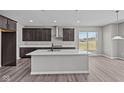 Modern kitchen with stainless steel appliances, quartz countertops and island at 1069 Ridgevine Rd, Greenwood, IN 46143