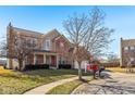 Beautiful two-story home with a well-kept lawn and landscaping, showcasing its inviting curb appeal at 18822 Gusset Ct, Noblesville, IN 46062