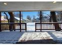 Wooden deck overlooking a snow-covered backyard at 2817 S Rybolt Ave, Indianapolis, IN 46241