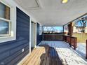 Snow-covered deck with access from the house at 2817 S Rybolt Ave, Indianapolis, IN 46241