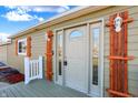 Inviting front entrance with a modern door and wood accents at 3415 Delmar Ave, Indianapolis, IN 46241