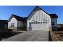 Charming, newly built two-story home featuring a white facade, a 2-car garage, and professional landscaping at 4068 Berry Chase Blvd, Greenwood, IN 46143