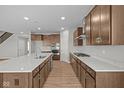 Modern kitchen featuring granite countertops, stainless steel appliances, and wood flooring at 4068 Berry Chase Blvd, Greenwood, IN 46143