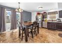 Kitchen with stainless steel appliances and dark brown cabinets at 6232 Emerald Springs Dr, Indianapolis, IN 46221