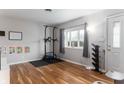 Home exercise room with hardwood floors and a pull-up bar at 117 N Manngrove Ln, Muncie, IN 47303