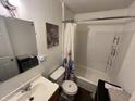 Small bathroom with shower/tub combo, toilet, and vanity at 1801 E 23Rd St, Muncie, IN 47302