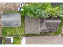 An aerial view showcasing the roof, surrounding greenery, and parking space for this residential property at 1819 Southeastern Ave, Indianapolis, IN 46201