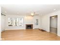 Bright living room featuring hardwood floors and a fireplace at 4621 E 37Th St, Indianapolis, IN 46218