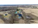 Vast land parcel featuring ponds, structures, and proximity to a highway at 5682 N Michigan Rd, Fairland, IN 46126