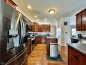 Spacious kitchen with stainless steel appliances and hardwood floors at 5876 Sunnyvale Dr, Bargersville, IN 46106