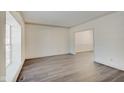 Spacious living room with large windows and hardwood flooring at 7891 Tufton Ct, Fishers, IN 46038