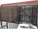 Wooden gate and walkway leading to condo entrance at 8360 Paso Del Norte Ct, Indianapolis, IN 46227