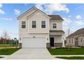 Attractive two-story home with a white exterior, attached garage, and lush lawn, situated near a playground at 1845 James Pierce Dr, Shelbyville, IN 46176