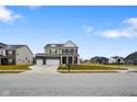 Beautiful two-story home with a three car garage and a well-maintained lawn in a quiet neighborhood at 4201 Risen Star Way, Bargersville, IN 46106