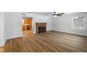 Living room with fireplace and hardwood floors at 48 Lincoln Dr, Brownsburg, IN 46112