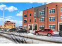 Townhouses in winter setting, street parking visible at 531 Fulton St, Indianapolis, IN 46202